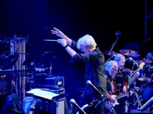Stewart Copeland Instagram - #PoliceDerangedForOrchestra is coming to Weimar’s Kunst Fest this summer! 
23 August. Don’t be late!

Featuring the wonderful voices of @laisesanches @msraquelbrown @sarahjanemusiq and all under the masterful baton of @eoutwater 
@polyartsmanagement