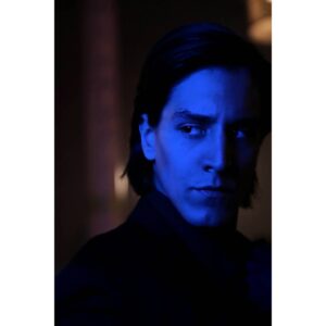 Temmuz Uğur Yıldız Instagram - there are two of us ◾▪ #lowlight #portrait #headshot #black #dark #bluelight  #cyan #shadow 
photo by @serdarkurtphotoframeofficial