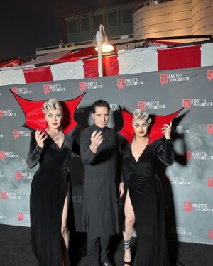 The Boulet Brothers Instagram - Happy 50th @knottsscaryfarm ! We had an incredible time at our favorite Haunt (and our favorite maze was Cinema Slasher)! Oh and the Legacy Museum is to die for. We’re already looking forward to next Halloween… it’s going to be magic! 😉

W/ @dastmalchian @bryanfullergram @violetchachki @gottmik (gown by @mindylamour hair @marcoswigs )