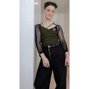 Theo Germaine Instagram - ~ they / them press date fit ~ 

styling: @benjaminholtrop 
styling asst: @emilykejohnson 
makeup: @thisjenna 
wearing: @siempre.world 
@k.ngsley @drmartensofficial @dionlee / @sofiaramsay / as well as a smile 

~ image description in alt. text <3