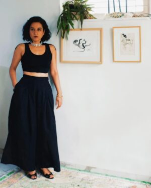 Tillotama Shome Instagram - Stiff neck and physio bands on, but #TribhuvanMishraCATopperOnNetflix promotions on full swing.

Stood besides the two very precious paintings by KG Subramaniyan thanks to @ennkishore the dynamic founder of @seagullbooks. I spend most of my hours at home in this space. The elements of play and power in these two paintings, provide much inspiration. Perfect for celebrating the world of Bindi Jain.

Wore a black outfit to match the physio bands .
Mid forty fashion adjustments.
Thank you to all those who have watched our show and sent such loving messages. Can't respond to them because of my neck 🤦 but a 🌹 and gratitude to all those who sent their love.
To those few ,who were lewd and obnoxious about Bindi's desire, I hope you find love.
Photos by @abeemanyousee

Top @notchabovecreations 
Pants @turnblackofficial 
Jewellery @theater.xyz 
HMU @themakeupwaley 
@asiya.ansari
Assisted by @raju.mahto8march