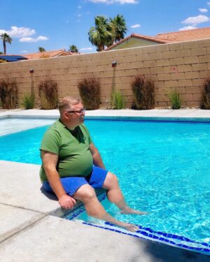 Tim Hooper Instagram - Ready for summer! A little shot from our weekend in #PalmSprings - where all us #bears seem to be these days. Sporting my new 🏊🏻‍♂️ @asos #plussize #swimwear, for when the pool ain’t private — if you know what I mean 😝

#plussizeswimwear #summerbear #summerfashion #desert #poolside #fatty #bigmenfashion #plussizemen #asos #cathedralcity #mustache