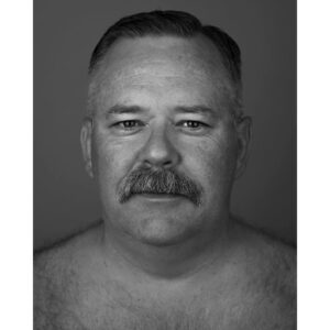 Tim Hooper Instagram - This is 50. This portrait was part of a series by the magical 📸@christiantrippe — that lead to a series of events and a few new opportunities. I think it adds me a bit of mystery. What do y’all think?

#portrait #bearflavored #bearart #actorphotography #blackandwhite #mustache #mustachebear #wilfordbrimley #nationalselfieday