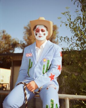 Todd Smith Instagram - Cowboy Clown @todderic ⭐️
Photographer: @carianneolder 
Producer: @polderexpress
Videographer: @bysammismith
Makeup: @downtoclownmakeup
Stylist: @brandenruiz
Custom suit: @stonedbymegs
Boots: @pskaufman 
Location: @lilbarnridingschool
Shot on @kodakprofessional #kodak200