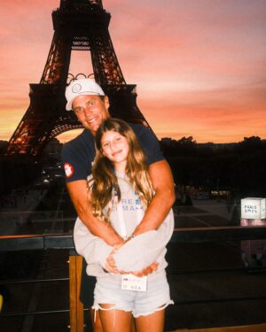Tom Brady Instagram - I didn’t quite know what to expect going into @Paris2024, but our three days truly went above and beyond what i could ever have imagined. We saw athletes from many sports and many countries, but it was especially meaningful to be able to come to this incredible city with my daughter and watch the most powerful women I’ve ever seen, fight for gold, silver and bronze. For the first time in Olympic history there was a 50:50 split of female and male athletes, a stat I was proud to tell Vivi as she watched these heroes compete. 

Sports are truly unique all over the world with how they bring so many people together, and bring out the best in all of us, both competitors and fans. I certainly seemed to be living and dying with each of the performances, with a great appreciation for the hard work, commitment, and dedication It takes to compete at this level.

I’ve said it a few times lately, but we should all aspire to do HARD things. Whether it’s in sports or in life, push yourself beyond your comfort zone to see what you can really accomplish. Just like these athletes all across the world have done! Congratulations to the champions, the competitors, and the entire city of Paris on a once in a lifetime event With countless memories and enduring relationships