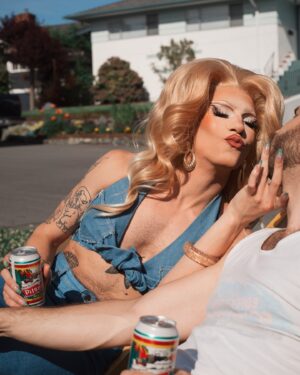 Vivian Vanderpuss Instagram - Crack open a cold one for dad. ☀️ 
.
These are the first of a series of pictures taken by Socrates D. styled by me. I wanted to capture those fab vintage vintage vibes! Thanks for the lawn chairs @ejmears !
💇🏼‍♀️hair by me
👙Top by me 
👖 vintage Viceroy from @cheersvintagecollective 
#vivianvanderpuss #canadasdragrace #70s #vintage #vibes #fathersday #denim #summer #solstice