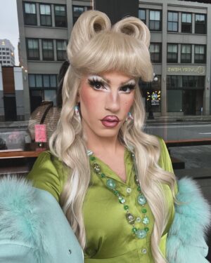 Vivian Vanderpuss Instagram - ❄️🍃 
Okay I love this colour combo. The wig used to have a kind of curly bumper bang moment but I brushed it out and made this mega “curtain bang”. Honestly it’s having a bit of an identity crisis but @queen.irmagerd said it was “Hedwig meets the Brady Bunch”. 
My earrings are vintage wooden dolphins that look like they’ve been up for days.🎉🐬 
#outfitsforacrispautumnday