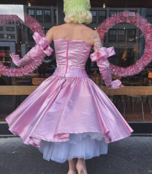 Vivian Vanderpuss Instagram - 🌸Sugar Plum Fairy🧚🏼‍♂️ 

I hope y’all have a happy holidays. ✨

I’m so proud of this dress I made inspired by a couple of different pieces from @butchwaxvintage . I’m especially in love with the structured bow-gloves. 
This green tinsel bubble cut is styled by me as well!