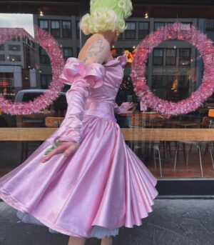 Vivian Vanderpuss Instagram - 🌸Sugar Plum Fairy🧚🏼‍♂️ 

I hope y’all have a happy holidays. ✨

I’m so proud of this dress I made inspired by a couple of different pieces from @butchwaxvintage . I’m especially in love with the structured bow-gloves. 
This green tinsel bubble cut is styled by me as well!