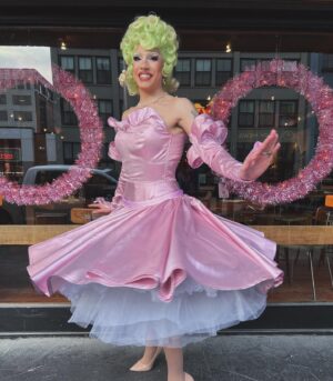 Vivian Vanderpuss Instagram - 🌸Sugar Plum Fairy🧚🏼‍♂️ 

I hope y’all have a happy holidays. ✨

I’m so proud of this dress I made inspired by a couple of different pieces from @butchwaxvintage . I’m especially in love with the structured bow-gloves. 
This green tinsel bubble cut is styled by me as well!