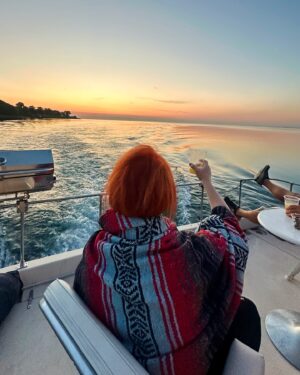 Wynonna Judd Instagram - Boat hair, don’t care 💛⛵️🌅🥂