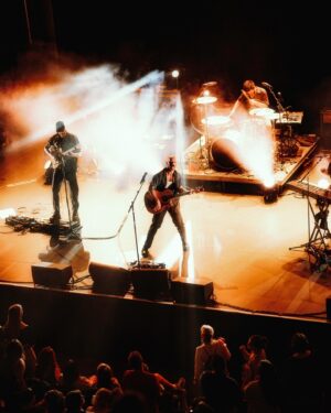 X Ambassadors Instagram - NEW YORK. BOSTON. And… ITHACA. Wow.

These last few shows have really brought the Townie tour home for us (literally and figuratively). NYC we got to play at one of the most historic venues in the city, right around the corner from where we first met Adam (shout out Loeb Hall dormitory) and where XA truly BEGAN; Boston you showed us for the umpteenth time how much XA love you have to give (spoiler: it’s a LOT); and finally…. Our hometown show in Ithaca. The town we wrote this entire album about.

We will NEVER ever ever forget this show at the State Theater. Playing these songs in front of a townie crowd… personally I can’t tell you the thrill I got hearing everyone cheer after every Ithaca lyrical reference— “New Year’s at the Chanticleer…”, “meet me at the Thurston Ave Bridge”, “We drive past McCormick Prison out on 79”, “lost his job last week bagging groceries at the P&C”. And there were so many of you there who knew Todd! Who loved him as much as we did. We all got a chance to ugly cry together and remember him together. I’m still a puddle. My body is a wreck. But my heart is so so so full. Thank you thank you thank you.

Two more weeks left of the Townie Tour. 🥹❤️

📸: @christian.x