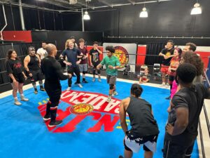 Yujiro Kushida Instagram - Thank you everyone. The NJPW Academy Summer Class has graduated. If you go to a restaurant, they won't bring you food unless you give them a clear order. In the same way, you need a clear order to make what you want happen IN YOUR WRESTLING LIFE.
Let's keep working hard. See you backstage somewhere in some country.
@njpwacademy @njpw_global 

And Fred Rosser, who was my co-coach in this class, has amazing teaching skills. I was happy to work next to him. I was able to grow as well.
@realfredrosser and also Special thanks @shanetmdk 
#ケツメイシ

NJPWアカデミーサマークラスが卒業を迎えました。
あなたがレストランに行って、明確な注文をしない限り料理は運ばれてきません。
同じように、プロレス人生で自分はどうなりたいのか？
明確なオーダーが必要です。
言語の習得を目標にするのではなくて、その言語で何をするか何をしたいか？
これは私が旅していく中で学んだことです。
これからも頑張っていきましょう。
そして、どこかの国の団体の控室でお会いしましょう。