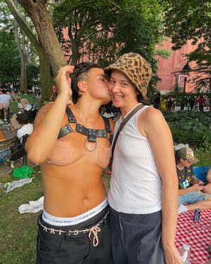 Zoe Terakes Instagram - Here’s some NYC Pride joy, before it all got really shit. Thousands of queer and trans people all gathered in a packed Washington Square park; celebrating the fuck out of each other, loving on each other so hard. Then people started running. Then we heard what sounded like gunshots. A few of them. We ran for our lives. People got trampled on, people were bleeding, crying, screaming. People just kept yelling, “Shooter! There’s a shooter!” I ran to the nearest building and hid in a janitors closet for two hours with 4 strangers cos I lost all my friends in the masses. Turns out some cunt stood in the middle of the park and fired fireworks at people. AT people. Hurt people. I’m grateful it wasn’t a gun, but how fucked is that sentence? This was a scare tactic. And it was successful. It was a completely devastating reminder of just how much queer and trans people in this country are fearing for their lives. How constantly on edge everyone feels. How fucking unsafe this place is. That there are now ‘shooting scares.’ I’d never felt so much euphoria as I did on Sunday. Never felt more myself. I cried tears of belonging. I’ve also never felt so terrified as I did on Sunday. I didn’t know if the people I loved were alive and vis versa. Shit was fucking traumatic. And I’m so fucking tired of this fear that is woven so tightly into the fabric of queer life. I’m so fucking tired of feeling like no joy comes for free, that there’s a catch, that we’ll have to pay for it somehow. Because, more often than not, we do. And it breaks my fucking heart. It breaks my fucking heart.