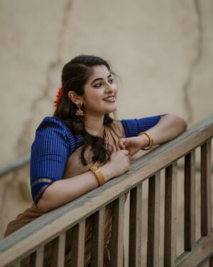 Aima Rosmy Sebastian Instagram - Getting into the Onam spirit with a touch of tradition in a different style 🌼 

Attire @riti_boutique 🥻
Clicked by @midhun.mohan_ 📸