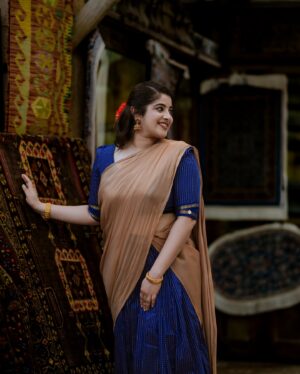 Aima Rosmy Sebastian Instagram - Getting into the Onam spirit with a touch of tradition in a different style 🌼 

Attire @riti_boutique 🥻
Clicked by @midhun.mohan_ 📸