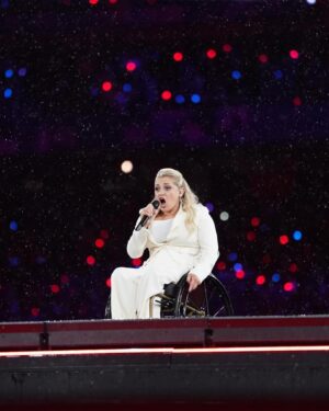 Ali Stroker Instagram - What an honor to sing the National Anthem tonight in Paris!!! It felt like a dream, especially in the rain! Congratulations to all the athletes who competed in this year’s Paralympics. #NextUpLA28 
Love you all! 🤟🏻
📸 @lizkreutz