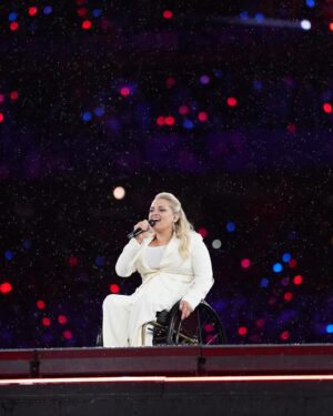 Ali Stroker Instagram - What an honor to sing the National Anthem tonight in Paris!!! It felt like a dream, especially in the rain! Congratulations to all the athletes who competed in this year’s Paralympics. #NextUpLA28 
Love you all! 🤟🏻
📸 @lizkreutz