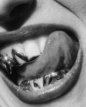 Alina Pash Instagram - If you’re bold enough to peep my custom silver grillz from the one and only @AlligatorJesus, you’ll spot a secret word — and trust me, it’s got something to do with you too 💀❤️
_________
Photo @daniel.rubinshtein 
Photo @tony.muhin