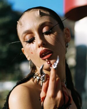 Alina Pash Instagram - If you’re bold enough to peep my custom silver grillz from the one and only @AlligatorJesus, you’ll spot a secret word — and trust me, it’s got something to do with you too 💀❤️
_________
Photo @daniel.rubinshtein 
Photo @tony.muhin