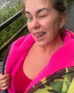 Amanda Lamb Instagram - Despite the vast of the majority of the country having sunshine, it’s raining in Devon… old me would’ve stayed indoors and probably been through a bottle of red by now..
This new version has just emerged from the sea in the pouring rain and it felt amazing… I even convinced the legend that is @ruthrubythursday66 to join me… never once have I regretted a swim… how’s the sunshine everyone?