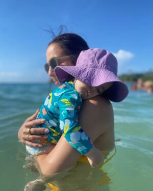 Anjelah Johnson-Reyes Instagram - Summer hits different with a baby. 

1 - Our first family vacation. Old San Juan, Puerto Rico
2 - Rosie’s first birthday party in San Jose
3 - Rosie‘s first birthday party in LA.
4 - Our first time at Wrigley Field in Chicago.
5 - The obligatory Chicago Bean picture
6 - Rosie‘s first time at the beach! San Juan, Puerto Rico.
7 - She decided the best place for a nap that day was in the ocean. I don’t blame her.
8 - Visiting the happy givers headquarters in Puerto Rico.
9 - Just besties being besties in a hotel hallway
10 - Bestie primas at their first family reunion!
11 - @sjearthquakes game!
12 - Fruit is liiiiife.
13 - Mom and dad had a night out.
14 - It’s in her blood.
15 - Lovers.
16- Vegas baby!
17 - Gotta get that workout in.
18 - Whoa. Send help.
19 - Double date night.
20 - Favs.