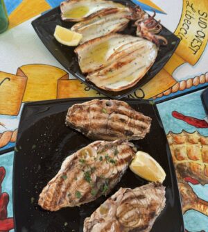 Anne Burrell Instagram - In my mind I’m still basking in the Sicilian sun… SUPER fresh fish, chilly white wine and FANTASTIC company!!! Just dreamy!!!! #theclaxtons #ilovewhatido #luckygirl #sicily #italy