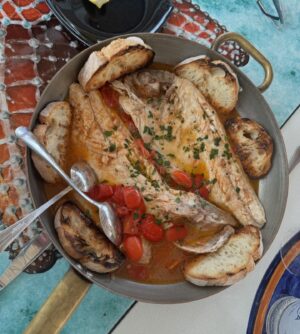 Anne Burrell Instagram - In my mind I’m still basking in the Sicilian sun… SUPER fresh fish, chilly white wine and FANTASTIC company!!! Just dreamy!!!! #theclaxtons #ilovewhatido #luckygirl #sicily #italy