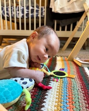Ashley Argota Instagram - happy 2 months of michael! he is a great sleeper, an okay napper, the king of spit ups, a lover of baths and story time, a best tummy time boy, and truly the best thing that has ever happened to us. 🥹🩵 (and yes my @tacobell blanket is on the rocking chair and used daily, leave me alone)