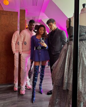 Ashley Park Instagram - purple is my new happy color and filming with my faves never gets old. who else is ready for the rest of #emilyinparis season 4 this week?? 💜