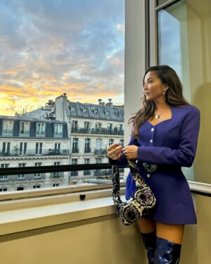 Ashley Park Instagram - purple is my new happy color and filming with my faves never gets old. who else is ready for the rest of #emilyinparis season 4 this week?? 💜