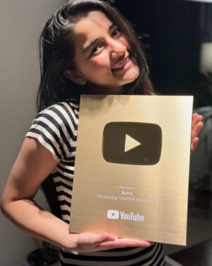Aurra Bhatnagar Badoni Instagram - We made it 🥹🫶🏻✨ 
Gold gold gold got gold from none other than @youtube I want to take a moment to realise how far we have come today like 1 MILLION SUBSCRIBERS MY GODDD I can’t believe it till I got this beauty n now holding this beauteous in my hands is surreal 🥹 thank u so much it wouldn’t have happened if u guys were not there thank u so much love ya my @youtube fam ❤️✨ n thank u mum the real women behind everything by managing my all social platforms n being my camera man,fashion designer n what not @deeptibhatnagarbadoni <3 🫶🏻✨🥹

~ love Aurra 🤍✨🫶🏻