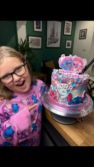 Briony May Williams Instagram - How to make a Stitch cake in under a minute 💕 Nora was a very happy pickle ☺️ #cake #cakedecorating #baker #recipes #GBBO #cakedesign #cakeart #stitch #liloandstitch #angelstitch