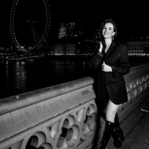 Charlotte Kirk Instagram - Timeless moments in London, where my smile shines brighter than the night ✨ 
.
.
.
.
.
.
.
.
.
.
.
.
.
.
.
.
Photo by @bastekczernek 
#Charlottekirk #Charlottekirkofficial #actress #LondonNights #CityLights #LondonEye #BlackAndWhite #NightVibes #SmileInTheCity #TimelessMoments #TravelDiaries #LondonLife #UrbanAdventure #behindthescenes #love #awardwinning #blackandwhitephotography #blackandwhite #instagood #tuesday #tuesdaymotivation #londonlife #womenempowerment #womenboss