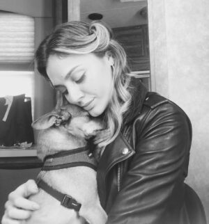Christine Evangelista Instagram - A girl and her dog. A dog and his girl. A love story. 

My Buddy, my dear little Buddy, You impeccably and meritoriously lived up to your name. 
While the loss of your physical presence brings me to my knees in grief and pain, in between my breaths for air, I hold onto my deep, deep gratitude for you, Buddy. 
Thank you Buddy. Thank you for your unwavering, unconditional love. Thank you for your devotion and your service to me. Thank you Buddy for meeting me 10 years ago just when I needed you. When my life became more transient and inconsistent than ever. Thank you Buddy for being my constant. 
Thank you for being ready to go wherever, whenever. When my bags were being packed you were ready by the door. Thank you for sprinting through airports and train stations with me. Thank you for waiting in my trailer while I worked all day, thank you for living in homes, apartments, hotels and motels. Thank you for reminding me that we were always “home” when we were together. 
Thank you for our emotional connection, thank you for being my emotional support. Thank you for catching my tears on your head. Thank you for your intuition. Thank you for resting your head on my chest as my heart was hurting or I was feeling anxious. Thank you for playing with me. Thank you for dancing with me. Thank you for hanging on my every word and for understanding me even without them. 
Buddy - I thank God for you. We really did save each other in this lifetime …and my dearest buddy, I know we will save each other, yet again, in our next.