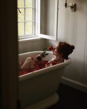 Courtney Halverson Instagram - I am nothing if not a hopeless romantic. Forever searching for the songs and books and movies and poems that make my heart swell and nearly break each time, before gently mending itself again and again. 🥀 and chances are if you’ve ended up on my little corner of the internet, you feel the same. 

So here’s to us who play the saddest songs and languish in the bath and feel all the feelings. We’re just hopeless romantics. 

ps : if you have a song to contribute to my ‘sad girl bath tunes’ playlist please let me know, I’m always looking to grow it. 📻 🥀 
.
.
.
#romanticstyle #vintagevibes #elegantstyle #redrosepetals #hopelessromantic