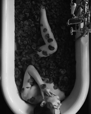 Courtney Halverson Instagram - I am nothing if not a hopeless romantic. Forever searching for the songs and books and movies and poems that make my heart swell and nearly break each time, before gently mending itself again and again. 🥀 and chances are if you’ve ended up on my little corner of the internet, you feel the same. 

So here’s to us who play the saddest songs and languish in the bath and feel all the feelings. We’re just hopeless romantics. 

ps : if you have a song to contribute to my ‘sad girl bath tunes’ playlist please let me know, I’m always looking to grow it. 📻 🥀 
.
.
.
#romanticstyle #vintagevibes #elegantstyle #redrosepetals #hopelessromantic