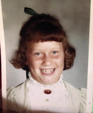 Dot-Marie Jones Instagram - Not sure if I’m late. But Happy #schoolpictureday I think this was 2nd grade? Or senior year?? Don’t remember!! Feeling fancy with my penny gumball broach . ( I was told not to wear it😏🤫😶😶😶)oooops