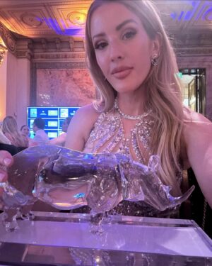 Ellie Goulding Instagram - Extremely grateful and overwhelmed to receive The Perfect World Foundation Award this year in Gothenburg. To follow in the footsteps of some of my heroes, Sylvia Earl, Sir David Attenborough and Doctor Jane Goodall, is the biggest honour. Tack så mycket @tpw_foundation . The work they do for our Planet is phenomenal. We were so obsessed with this dress and the light in my room that we had to take some spicy shots 🤣🤍
📷 @petrabjorstad / @antonengblomphotography 
Glam @mattiasstafsing / @patriklernberger 
@zuhairmuradofficial @kyledevolle ❤️‍🔥❤️‍🔥