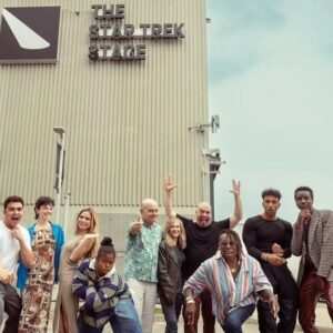 Gina Yashere Instagram - New journey, new TV family ... Yup, that is Holly Hunter & Paul Giammatti standing behind me. This lil girl from Bethnal Green, East London, is now acting opposite these GIANTS. 🤣
Today marks the official start of production on #starfleetacademy
on @startrekonpplus.
I'm excited for this! LET'S 'AVE IT CADETS! 🖖🏿🖖🏿 #livelongandprosper

#StarTrek Stage welcomes #StarfleetAcademy.
#ginabackinhollywood #comedian #showrunner #writer #actor