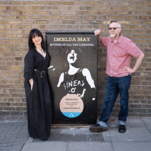 Imelda May Instagram - I’m so honoured to be recognised by Dublin Canvas in celebrating the living…! Thank you so much! 

Steve O’Toole (@urnique.steve ) the artist who started this initiative explains…

“Ireland is very good at commemorating & remembering our dead but we do little to celebrate our living. There are blue plaques all over Dublin to remember and mark how ‘Oscar was born here, Behan drank there, Joyce etc. and only in death Sinead, Shane and many many more are justly & rightly celebrated but whom in life were never given the accreditation they so rightly deserved. 

And so my Dublin Canvas submissions began last summer with  ‘Pat Ingoldsby’s … Welcome To His Head … Complete with ‘Not Dead Yet’ Blue Plaque. 

Continuing this year with ’Imelda May … Mother of all the liberties… With accompanying ‘Liberties Belle’ Blue Plaque. 

* Mother of all the Liberties - A nod to the hierarchy & history of the women of the Liberties, and to Imelda’s current role in MOATB. 
* Liberties Belle - Reflecting on both ‘The proudly born Liberties Imelda’ and to Imelda’s own wonderful piece ‘Liberty Belle’.  

On seeing Imelda’s reposting of Celia’s ‘Highly Commended’ in the Arts & Entertainment category at the British Press Photographer of The Year Awards, and Imelda’s accompanying copy …
‘This photo of me from Cambridge Folk Festival last summer. Sinéad had just gone. I painted my top impulsively Put on my mother’s chain, my Jeff Beck pendant. Walked onstage with my band and sang with all my heart. Emotional night captured. Friendship forever’. 
I knew instantly this was the only image to use. 

I cannot emphasise the outpouring of Liberty love & fondness for both Imelda and her family that has not only been expressed to me but also in turn extended to me by association. I am really going to miss working on this much loved piece.”

📸 on Meath St also by @ailecphoto

@dublincanvas 

#ImeldaMay 
#TheLiberties #TheLibertiesFestival #TheLibertiesDublin 
#DublinCanvas #DublinCanvasProject #DublinCityCouncil 
#ThisIsDublin #DublinEvents #Dublin8 #Dublin #Ireland