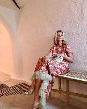 Janet Gunn Instagram - This dress by @ladoublej was my favorite, I think it was the whimsical movement of the fabric and definitely the feathers. It also looks great with sandals. 
Founder JJ Martin’s fabrics are made in Italy and she definitely captured the “spirit italiano”  and elevated energy for dressing! 
#ciaobella 
#ladoublej #italianfabrics #italianstyle #petitefashion #thesisterhood #sardinia #lifeisyourrunway #madeinitaly