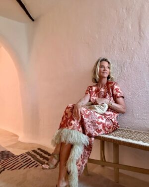 Janet Gunn Instagram - This dress by @ladoublej was my favorite, I think it was the whimsical movement of the fabric and definitely the feathers. It also looks great with sandals. 
Founder JJ Martin’s fabrics are made in Italy and she definitely captured the “spirit italiano”  and elevated energy for dressing! 
#ciaobella 
#ladoublej #italianfabrics #italianstyle #petitefashion #thesisterhood #sardinia #lifeisyourrunway #madeinitaly