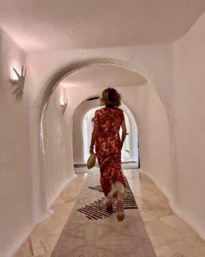 Janet Gunn Instagram - This dress by @ladoublej was my favorite, I think it was the whimsical movement of the fabric and definitely the feathers. It also looks great with sandals. 
Founder JJ Martin’s fabrics are made in Italy and she definitely captured the “spirit italiano”  and elevated energy for dressing! 
#ciaobella 
#ladoublej #italianfabrics #italianstyle #petitefashion #thesisterhood #sardinia #lifeisyourrunway #madeinitaly