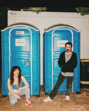 Jenny Lewis Instagram - big news from the @postalservicemusic euro tour!  not only did we return to the UK, spain & portugal after 21 years to play for oodles of folks but after ten years of eating zero gluten 
in paris i chomped many croissants & several baguettes and felt totally great. 
sea change moment for your gal !
also, @jimmytamborello and i went to Tangier 
and stayed at the beautiful @villamabrouka 
thanks to @gq for featuring it in the mag almost a year ago.  i cut it out and put it on my refrigerator and manifested this amazing trip. 
i read burroughs & bowles and the 
splendid and the vile and got a paint sample from the very cool staff at the villa 
so that i can bring a little bit of morocco back to the canyon.  madrid was amazing and bumping into @harrystyles at the fest was a total unexpected highlight !  i moved into the @hotelsamourparis for a few nights and felt right at home. 
also, hanging with  @joshuaradin @annakloots & @zachbraff was so fun & now 
this song will forever be in my head 
cue 
les champs-elysées 
one last @postalservicemusic show to go 
😭😭😭😭
and only three more shows to conclude the JOY’ALL era. 
it’s been a busy and joyful year & @bobbyrhubarblewis and i thank you 
and say 
BLESS!
cool 📸 by @saladjockey