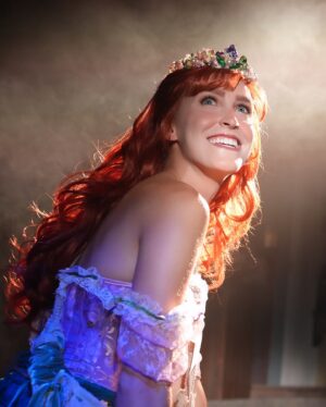 Jodi Benson Instagram - When Delaney was 4 yrs old, I brought her up on stage with me during my concert. I did a little interview with her before I started to sing my song “Part of Your World”. I asked her what she wanted to be when she grew up. She very quickly and confidently took the mic out of my hand and said , “I want to be Ariel when my Mommy dies!” Of course the audience broke out in laughter and so did I. She then started singing my song and didn’t really want to give the mic back to me. 
I knew in that moment that Delaney would one day become Ariel. 
My sweet girl, you truly were born to play Ariel. You made her your very own. You were so brilliant. You infused your joy, your humor, your passion and your love into every moment of her story.
It’s hard for me to find the words to express how I felt as I watched you on stage. I was and am so incredibly proud of you. Your vulnerability, strength, grace, courage, authenticity & confidence brought me to tears. Your voice was stirring & stunning and your version of “Part of Your World” was filled with such passion & determination. 
I love you, Delaney🩵
I’m honored to pass my treasured dinglehopper to you. 
You are, and always will be, my Ariel🧜‍♀️

…oh, and I’m so thankful I was still alive to see you become Ariel!😂