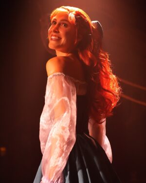 Jodi Benson Instagram - When Delaney was 4 yrs old, I brought her up on stage with me during my concert. I did a little interview with her before I started to sing my song “Part of Your World”. I asked her what she wanted to be when she grew up. She very quickly and confidently took the mic out of my hand and said , “I want to be Ariel when my Mommy dies!” Of course the audience broke out in laughter and so did I. She then started singing my song and didn’t really want to give the mic back to me. 
I knew in that moment that Delaney would one day become Ariel. 
My sweet girl, you truly were born to play Ariel. You made her your very own. You were so brilliant. You infused your joy, your humor, your passion and your love into every moment of her story.
It’s hard for me to find the words to express how I felt as I watched you on stage. I was and am so incredibly proud of you. Your vulnerability, strength, grace, courage, authenticity & confidence brought me to tears. Your voice was stirring & stunning and your version of “Part of Your World” was filled with such passion & determination. 
I love you, Delaney🩵
I’m honored to pass my treasured dinglehopper to you. 
You are, and always will be, my Ariel🧜‍♀️

…oh, and I’m so thankful I was still alive to see you become Ariel!😂