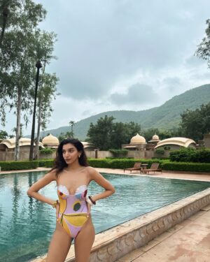 Juhi Godambe Instagram - A rainy swim 🌂🌴