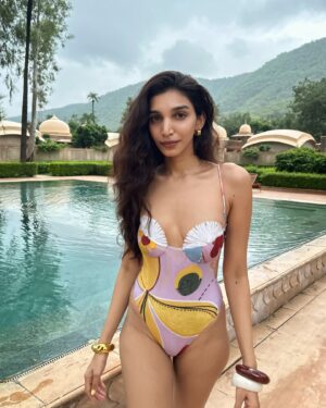 Juhi Godambe Instagram - A rainy swim 🌂🌴