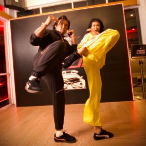 Kelly Tandiono Instagram - My Bruce Lee look inspiration for Puma Car Club 2024 the new collection is sickkkk and was nice battling with you @akiyamachoo 💪💪💪
.
#PumaCarClub2024 #PumaMotorSport #PumaID
